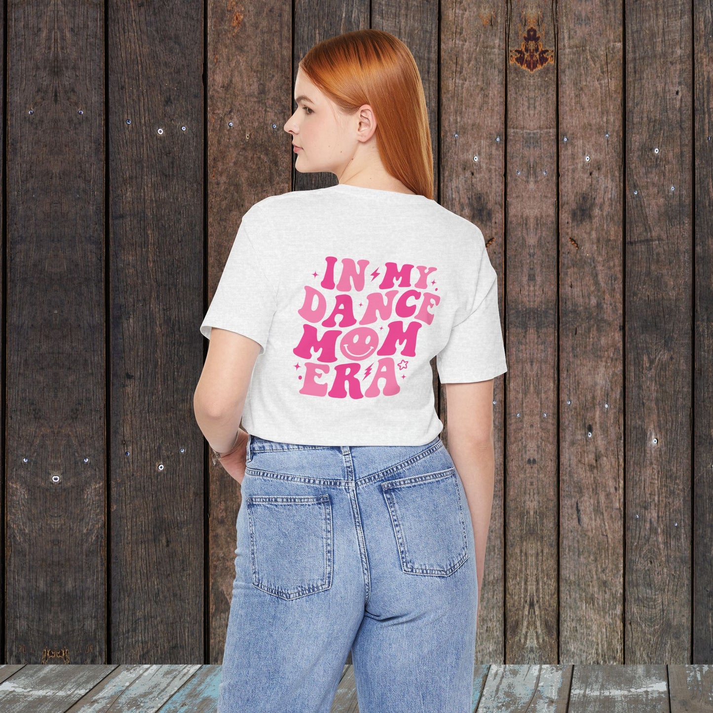 In my Dance mom era retro wavy Pink with happy face mom shirt